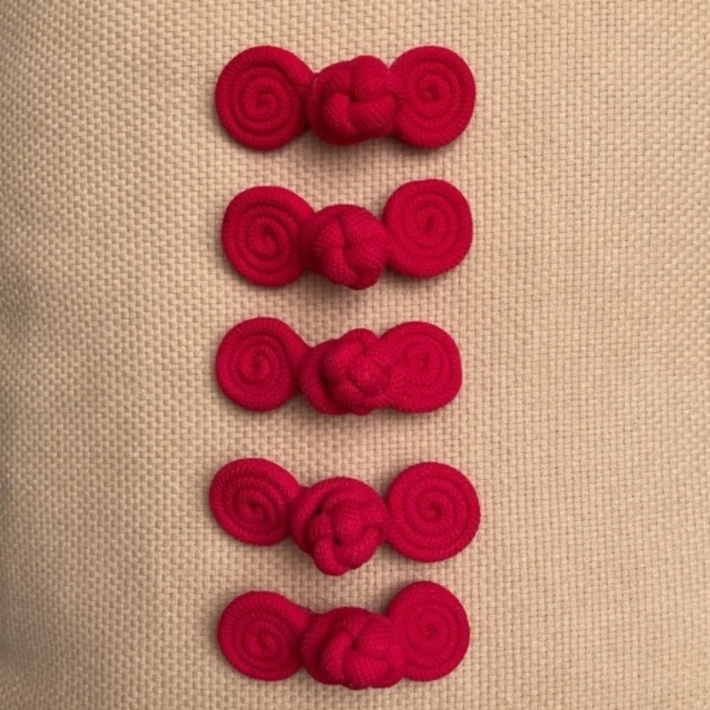 1980s 5 pairs of frog closures made from fuchsia pink cording, 3” long